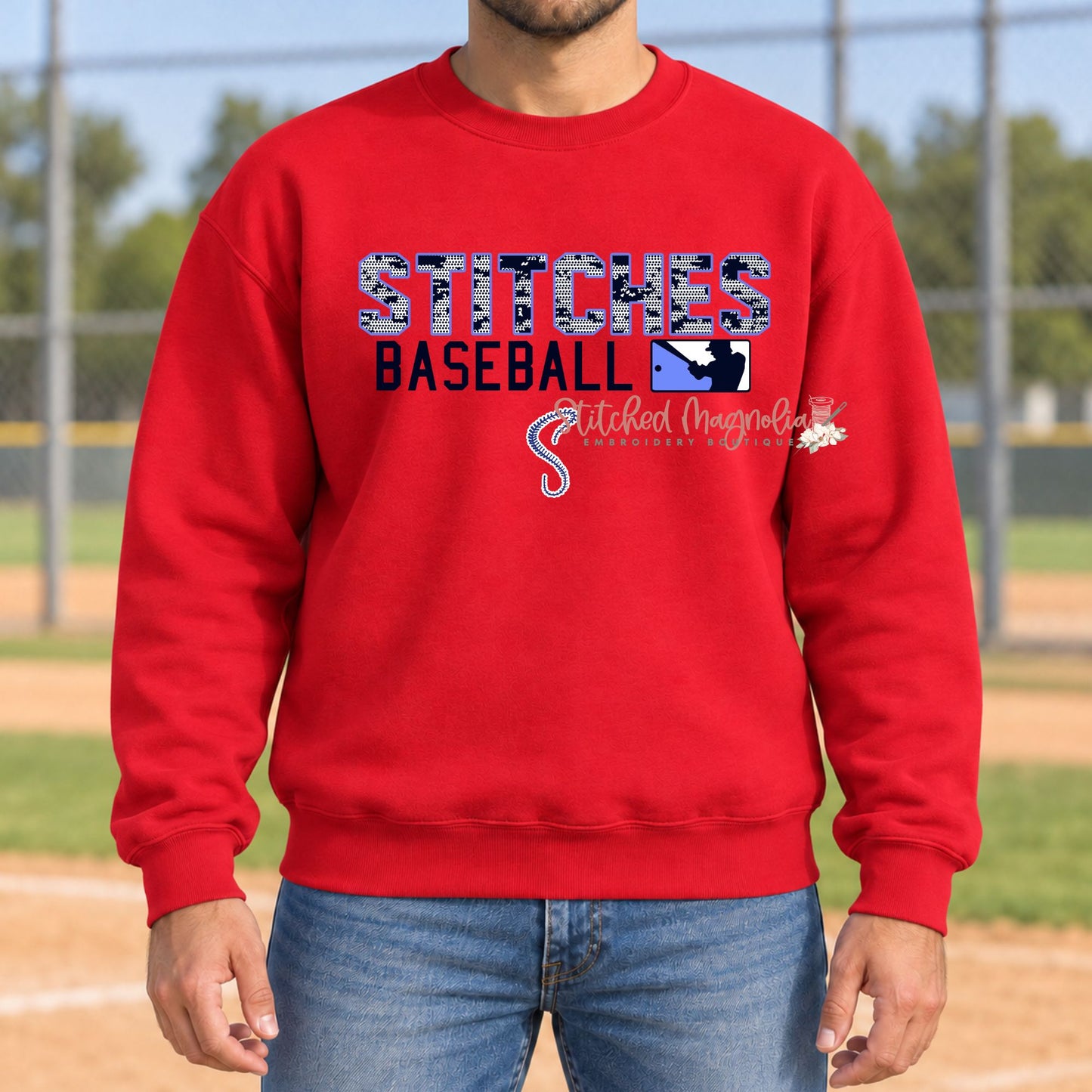 Red Stitches Baseball crewneck sweatshirt with patterned lettering, a batter silhouette, and an S-shaped baseball-stitch graphic.