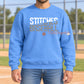 Blue Stitches Baseball crewneck sweatshirt with white and gray slash lettering and a small baseball graphic.