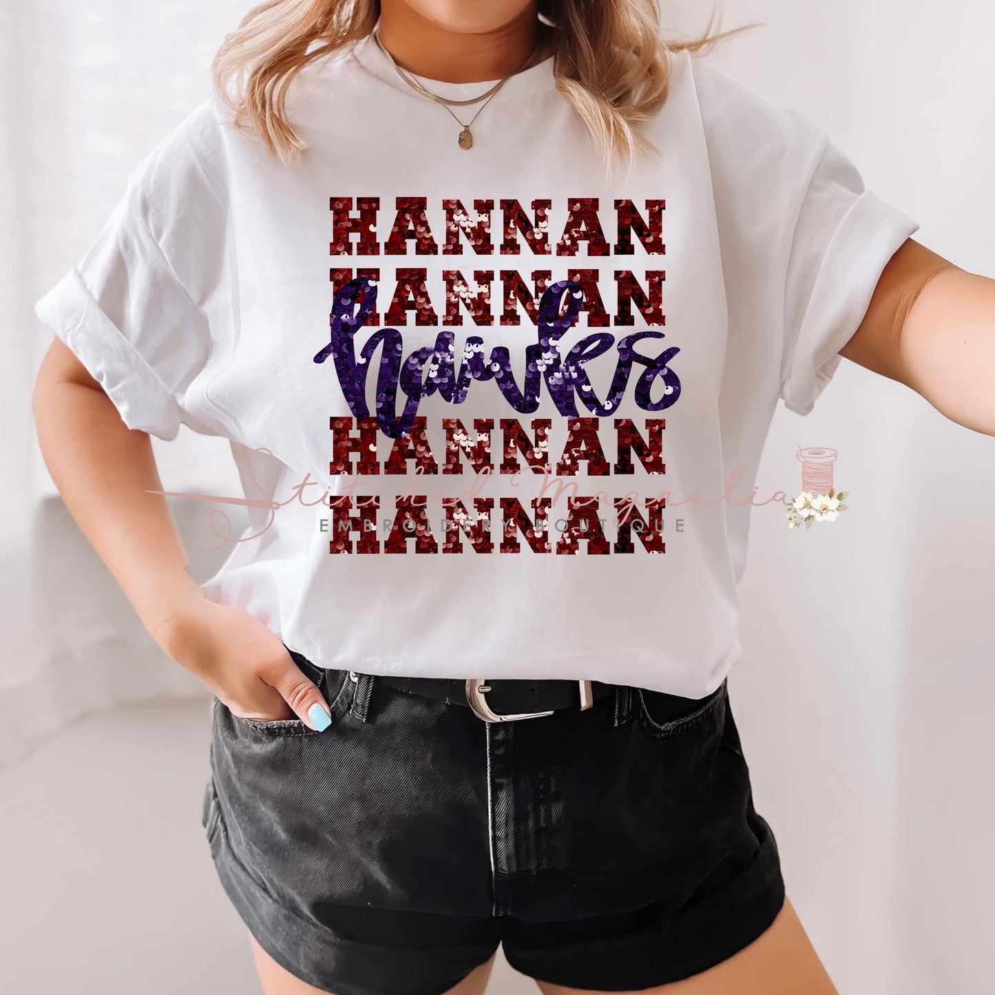 Hannan Hawks Stacked Faux Sequin Wordmark with Purple Script Tee