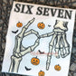 Six Seven Halloween Youth Shirt | Skeleton Hands with Pumpkins
