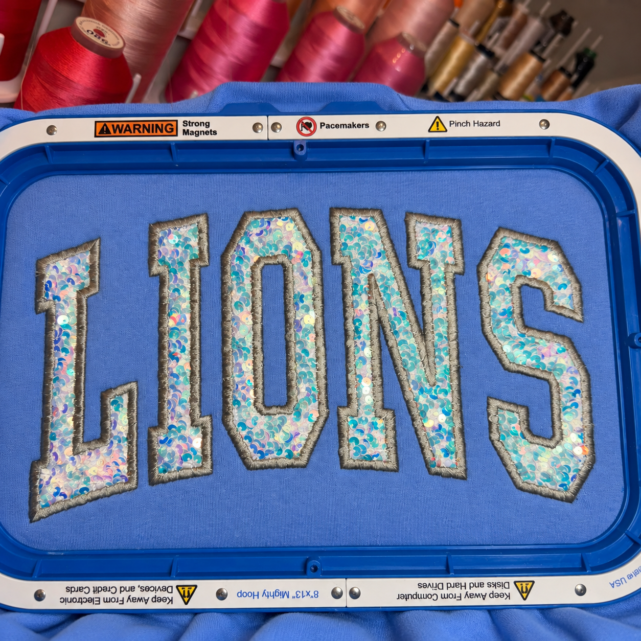 Lions Iridescent Sequin Appliqué Embroidered Sweatshirt | Carolina Blue