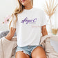 Lega-C Baseball Script Logo Tee in white with bold purple script wordmark