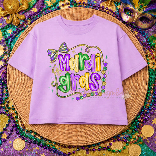 Mardi Gras Bow & Beads Purple Boxy Tee | Purple Green Gold Frame Design | Festive Mardi Gras Shirt