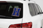 Varsity letter transfer on white SUV rear window